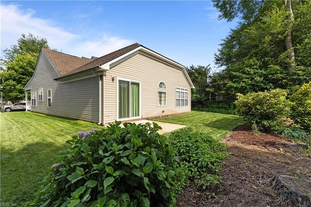 2612 Einstein Dr, Virginia Beach, VA 23456 - back of property with a yard and roof with shingles
