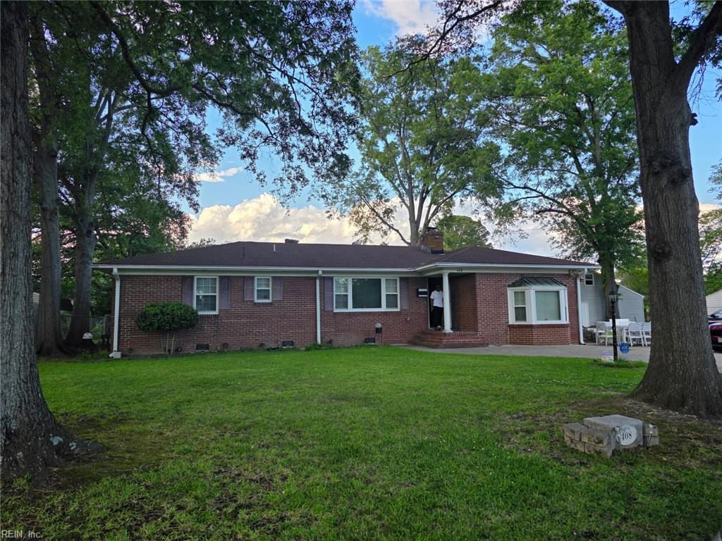 38 Franktown Rd, Hampton, VA 23663 - view of front facade with brick siding, a front yard, crawl space, and a chimney