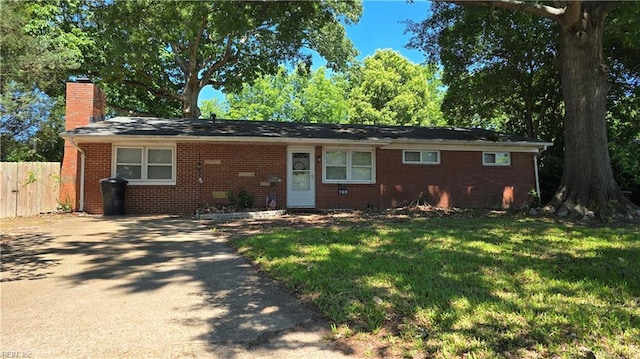 769 Olivieri Ln, Virginia Beach, VA 23455 - ranch-style house with a chimney, brick siding, and driveway