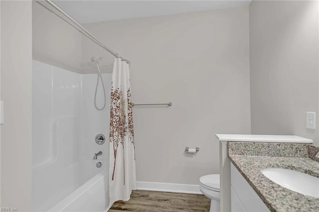 101 Daybeacon St, Yorktown, VA 23692 - full bathroom with toilet, wood finished floors, vanity, shower / tub combo with curtain, and baseboards