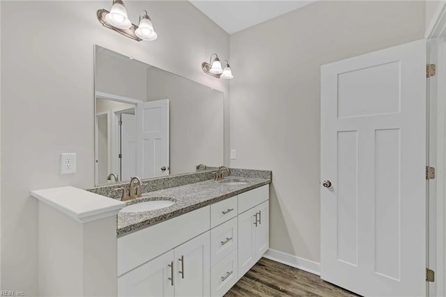 101 Daybeacon St, Yorktown, VA 23692 - full bathroom featuring double vanity, wood finished floors, and baseboards