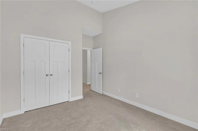101 Daybeacon St, Yorktown, VA 23692 - unfurnished bedroom with carpet flooring, baseboards, and a closet