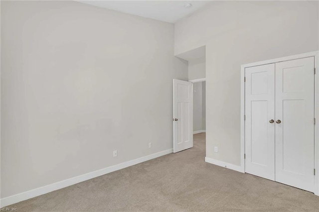 101 Daybeacon St, Yorktown, VA 23692 - unfurnished bedroom featuring carpet flooring, baseboards, and a closet