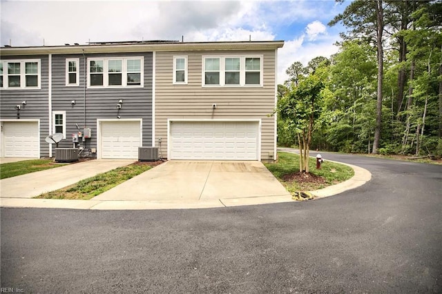 101 Daybeacon St, Yorktown, VA 23692 - view of front of house with central air condition unit, driveway, and an attached garage