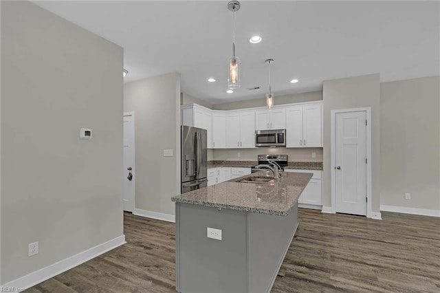 101 Daybeacon St, Yorktown, VA 23692 - kitchen with appliances with stainless steel finishes, a sink, baseboards, white cabinetry, and dark wood finished floors