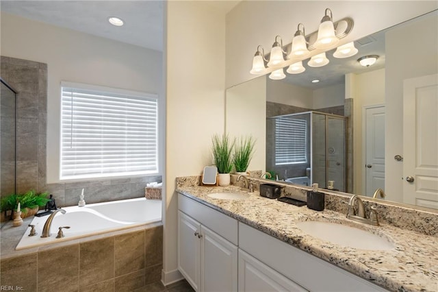 145 Beacon Run, Suffolk, VA 23435 - bathroom featuring double vanity, a shower stall, and a bath