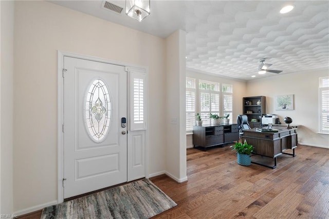145 Beacon Run, Suffolk, VA 23435 - foyer featuring ceiling fan, wood finished floors, and baseboards
