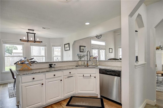 3145 Crestwood Ln, Virginia Beach, VA 23453 - kitchen with dishwasher, a sink, white cabinetry, light stone countertops, and baseboards