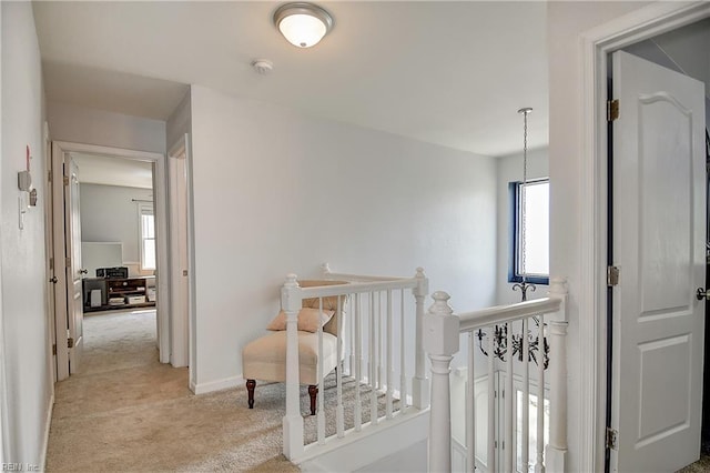 3145 Crestwood Ln, Virginia Beach, VA 23453 - corridor with an upstairs landing, light colored carpet, and baseboards
