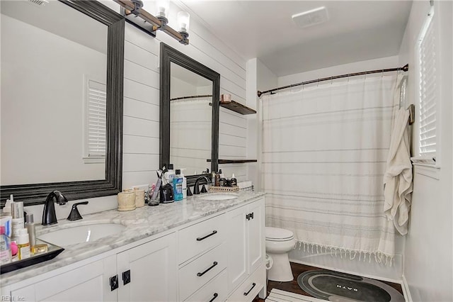 3145 Crestwood Ln, Virginia Beach, VA 23453 - bathroom featuring toilet, double vanity, and curtained shower