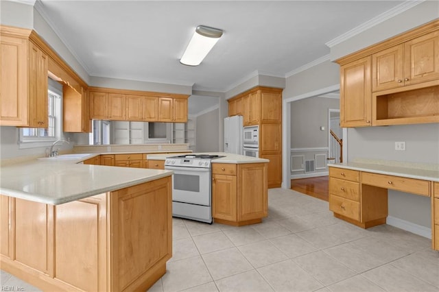 2288 Souverain Ln, Virginia Beach, VA 23454 - kitchen featuring white appliances, a sink, a peninsula, crown molding, and light countertops