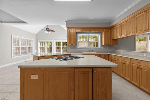 2288 Souverain Ln, Virginia Beach, VA 23454 - kitchen featuring light tile patterned flooring, a sink, a ceiling fan, light countertops, and electric stovetop