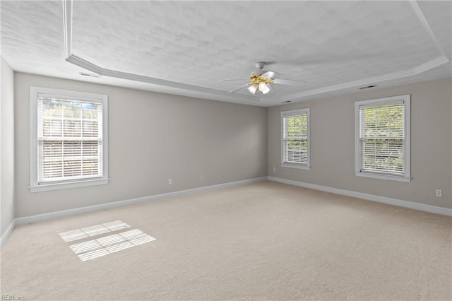 2288 Souverain Ln, Virginia Beach, VA 23454 - empty room with baseboards, a raised ceiling, light colored carpet, and a ceiling fan
