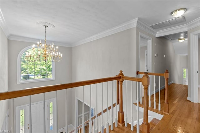 2288 Souverain Ln, Virginia Beach, VA 23454 - corridor featuring an upstairs landing, wood-type flooring, a chandelier, and crown molding