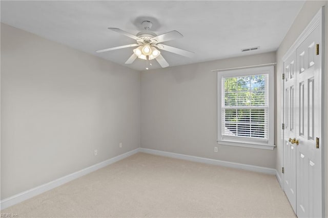 2288 Souverain Ln, Virginia Beach, VA 23454 - unfurnished bedroom with baseboards, light colored carpet, and a ceiling fan