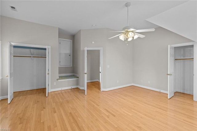 2288 Souverain Ln, Virginia Beach, VA 23454 - unfurnished bedroom featuring light wood finished floors, baseboards, two closets, and ceiling fan