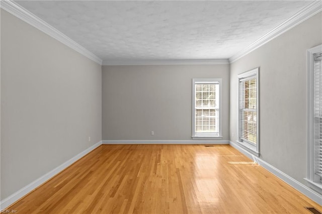 2288 Souverain Ln, Virginia Beach, VA 23454 - unfurnished room with light wood finished floors, baseboards, a textured ceiling, and ornamental molding