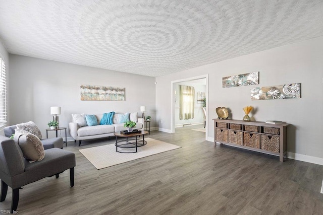 128 Wellons St, Suffolk, VA 23434 - living room featuring wood finished floors and baseboards