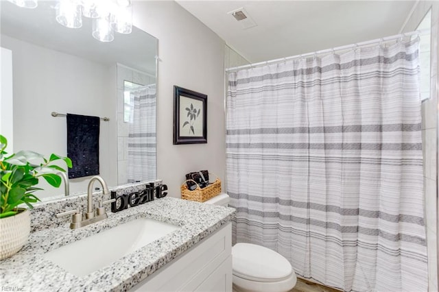 5553 Rock Creek Ln, Virginia Beach, VA 23462 - bathroom featuring vanity, toilet, and curtained shower