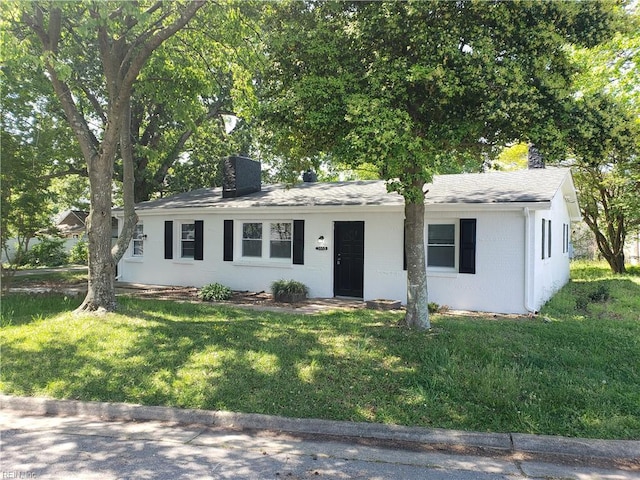 5553 Rock Creek Ln, Virginia Beach, VA 23462 - ranch-style home with a chimney, a front yard, and roof with shingles