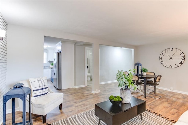 5553 Rock Creek Ln, Virginia Beach, VA 23462 - living room with light wood-style floors and baseboards