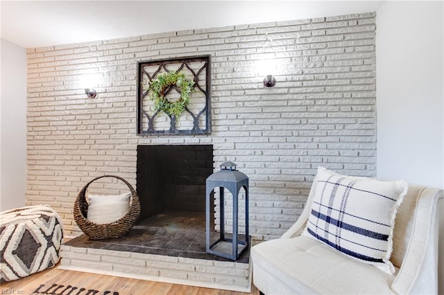 5553 Rock Creek Ln, Virginia Beach, VA 23462 - sitting room featuring wood finished floors and brick wall