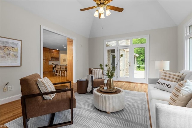118 Goose Hill Way, Smithfield, VA 23430 - living room featuring lofted ceiling, a ceiling fan, wood finished floors, and baseboards