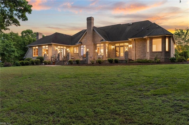 118 Goose Hill Way, Smithfield, VA 23430 - view of front of house with a chimney, brick siding, and a front lawn