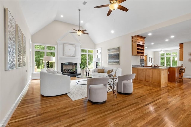 118 Goose Hill Way, Smithfield, VA 23430 - living room with ceiling fan, a fireplace, light wood finished floors, high vaulted ceiling, and recessed lighting