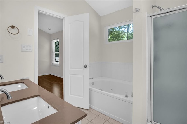 1300 Equinox Lndg, Chesapeake, VA 23322 - bathroom featuring a stall shower, a tub with jets, and a sink