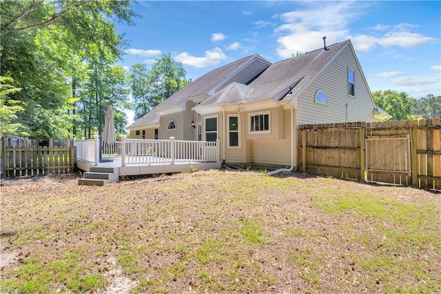 1300 Equinox Lndg, Chesapeake, VA 23322 - rear view of property with a wooden deck, a gate, and a shingled roof