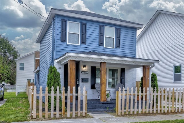 7430 Hughart St, Norfolk, VA 23505 - view of front of house featuring covered porch and brick siding