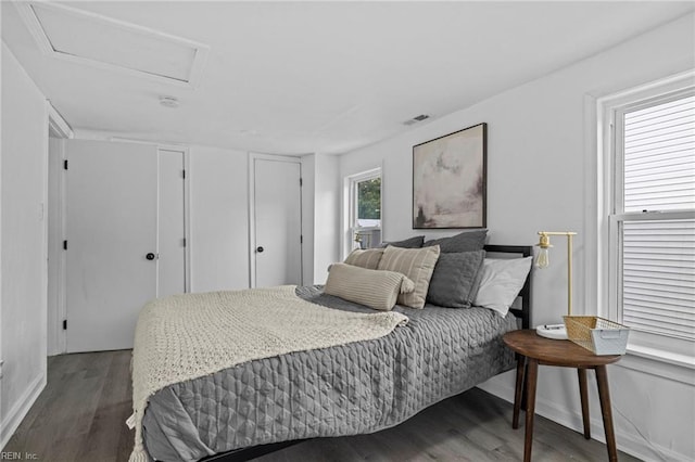 7430 Hughart St, Norfolk, VA 23505 - bedroom featuring attic access, wood finished floors, and baseboards