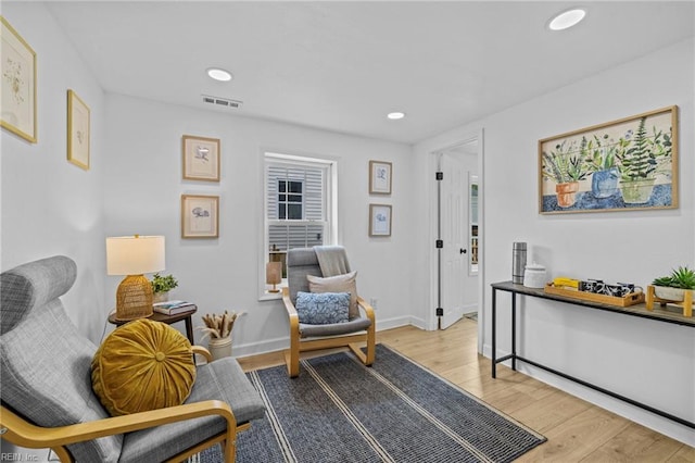7430 Hughart St, Norfolk, VA 23505 - living area with wood finished floors, recessed lighting, and baseboards