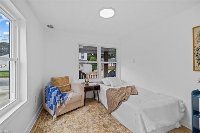 7430 Hughart St, Norfolk, VA 23505 - bedroom featuring wood finished floors and baseboards