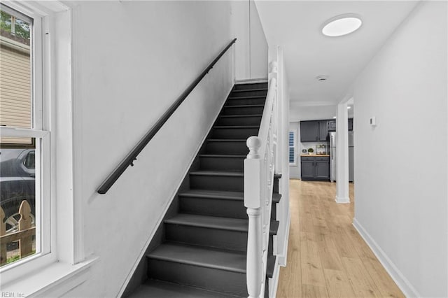 7430 Hughart St, Norfolk, VA 23505 - stairs with wood finished floors and baseboards