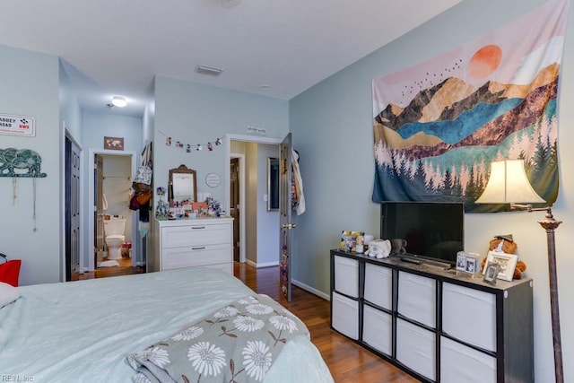 321 Duke St Unit 133, Norfolk, VA 23510 - bedroom featuring dark wood-style floors, baseboards, and ensuite bath