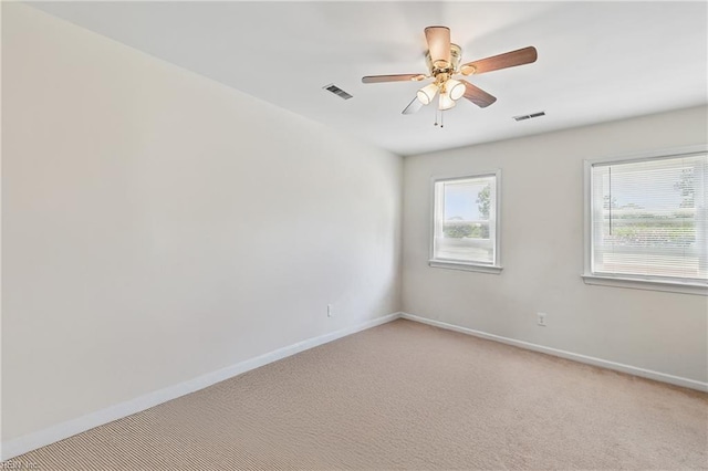 355 Nassau Pl, Hampton, VA 23666 - unfurnished room featuring light colored carpet, baseboards, and ceiling fan