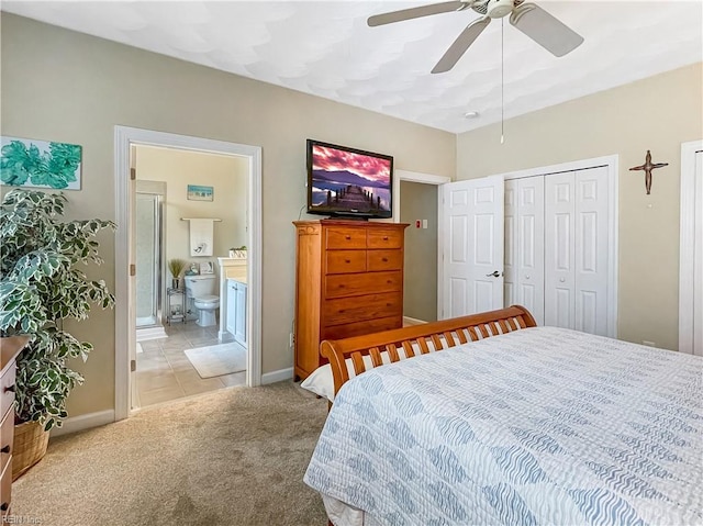 2884 Einstein Dr, Virginia Beach, VA 23456 - bedroom with light colored carpet, baseboards, ensuite bath, and ceiling fan