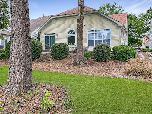 2884 Einstein Dr, Virginia Beach, VA 23456 - view of property exterior with a yard and roof with shingles
