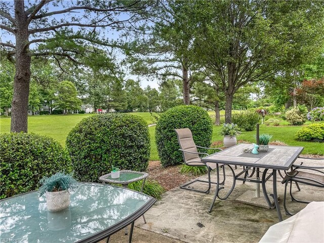 2884 Einstein Dr, Virginia Beach, VA 23456 - view of patio featuring outdoor dining space and view of wooded area