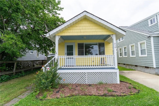 319 N First St, Hampton, VA 23664 - shotgun-style home featuring covered porch