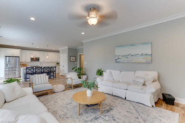 7412 Glenroie Ave, Norfolk, VA 23505 - living room with light wood-type flooring, ornamental molding, recessed lighting, a ceiling fan, and baseboards