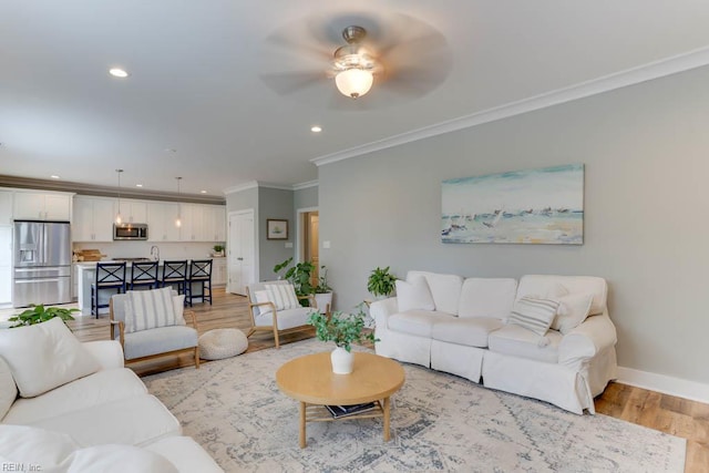 7412 Glenroie Ave, Norfolk, VA 23505 - living area featuring light wood-type flooring, ornamental molding, recessed lighting, baseboards, and ceiling fan