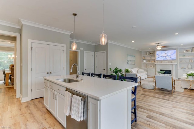 7412 Glenroie Ave, Norfolk, VA 23505 - kitchen featuring dishwasher, a sink, a kitchen breakfast bar, white cabinetry, and an island with sink