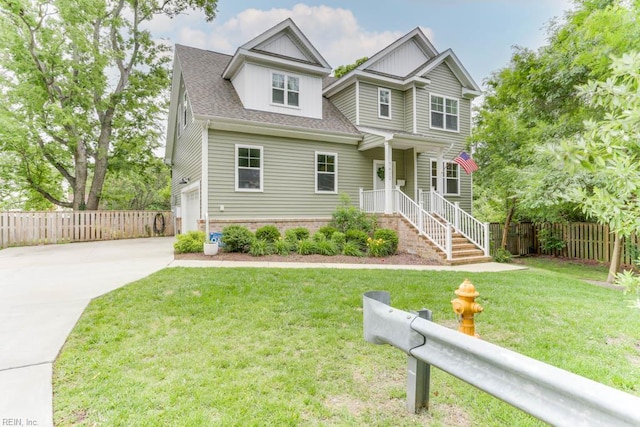 7412 Glenroie Ave, Norfolk, VA 23505 - view of front of house featuring concrete driveway, roof with shingles, and a garage