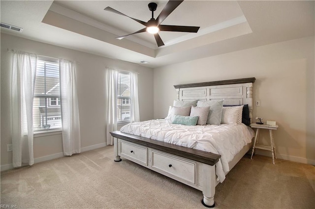 1621 Redwing Arch, Chesapeake, VA 23323 - bedroom with a tray ceiling, light colored carpet, multiple windows, and baseboards