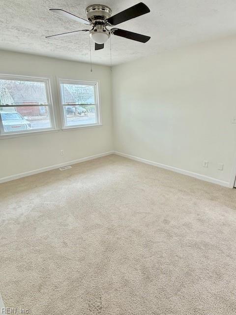 291 Fair Meadows Rd, Virginia Beach, VA 23462 - unfurnished room with baseboards, light carpet, and a ceiling fan