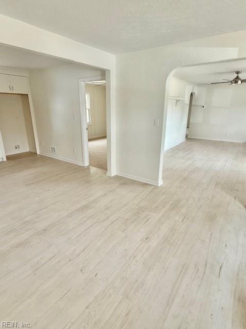 291 Fair Meadows Rd, Virginia Beach, VA 23462 - spare room featuring light wood-style floors, arched walkways, and baseboards