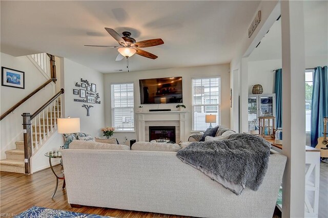 3729 Longhill Arch, Chesapeake, VA 23323 - living room with stairway, healthy amount of natural light, and a ceiling fan